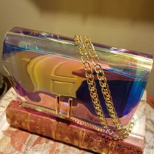 Holographic transparent acrylic purse.